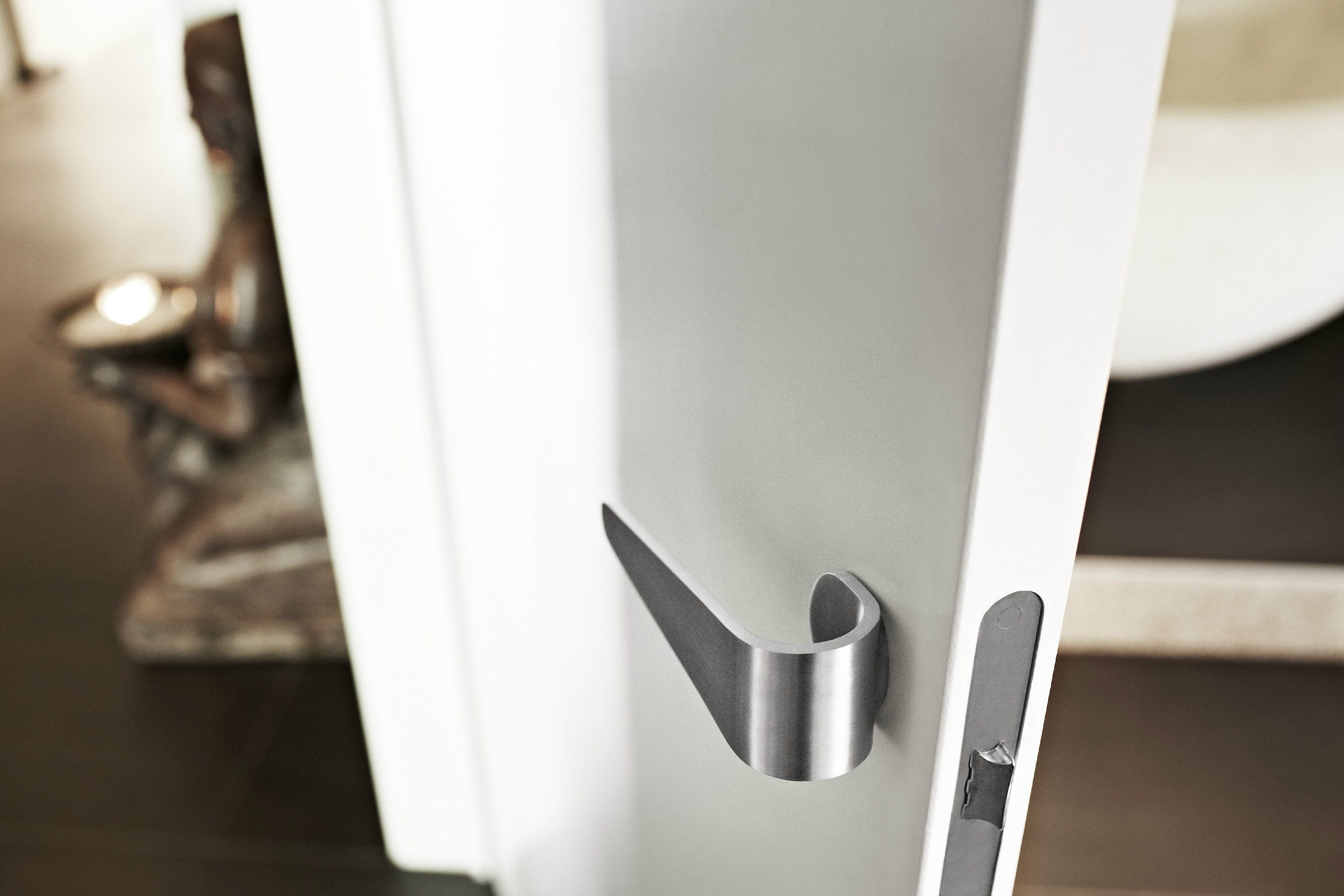 FOLD Door handle with lock by Formani Holland B.V. design Tord Boontje