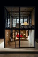 View into the double-height space of the Eames Pavilion prototype, 2026