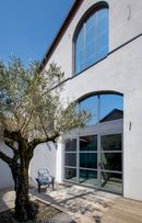 Loft a Monza con infissi a taglio termico Eku Perfektion HPS, Arch. Umberto Regalia - Ph. Andrea Angelucci