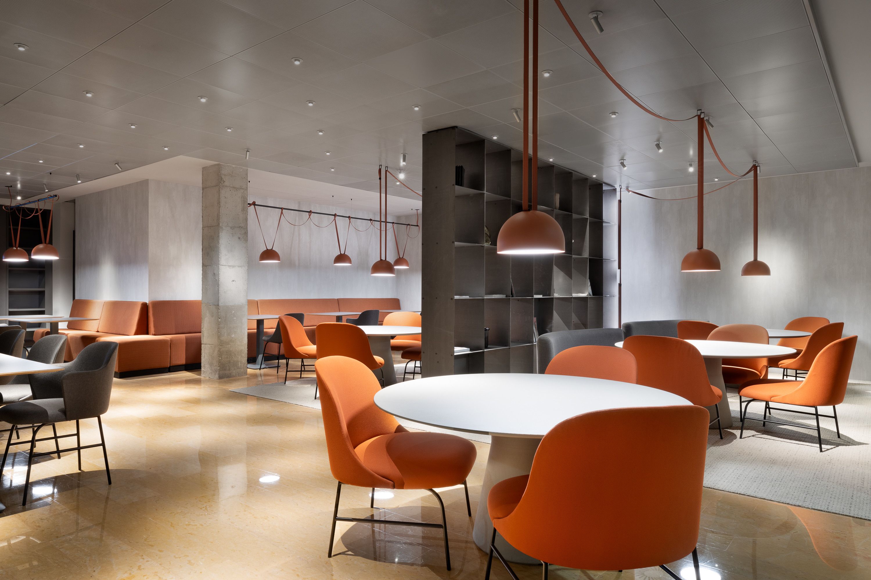 Vibia pendant lamps illuminate a coworking space in Barcelona