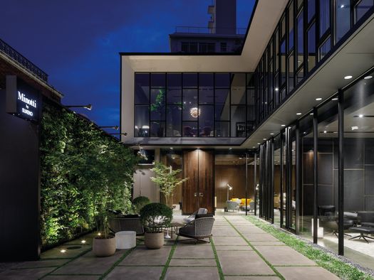 Metal, concrete, glass and vertical garden