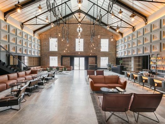 A River Storage of the 1800s Becomes an Industrial-Chic Hotel