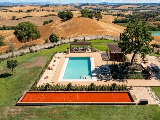 A Wooden Floor in Dialogue with the Sienese Hills