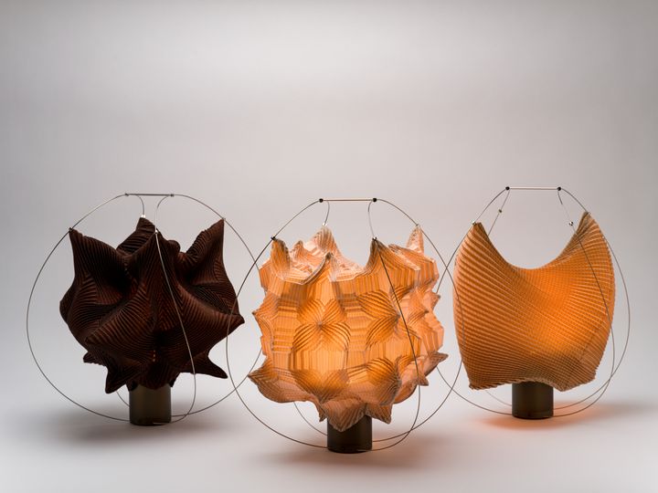 Portable lamps by Ambientec and A-POC ABLE ISSEY MIYAKE at