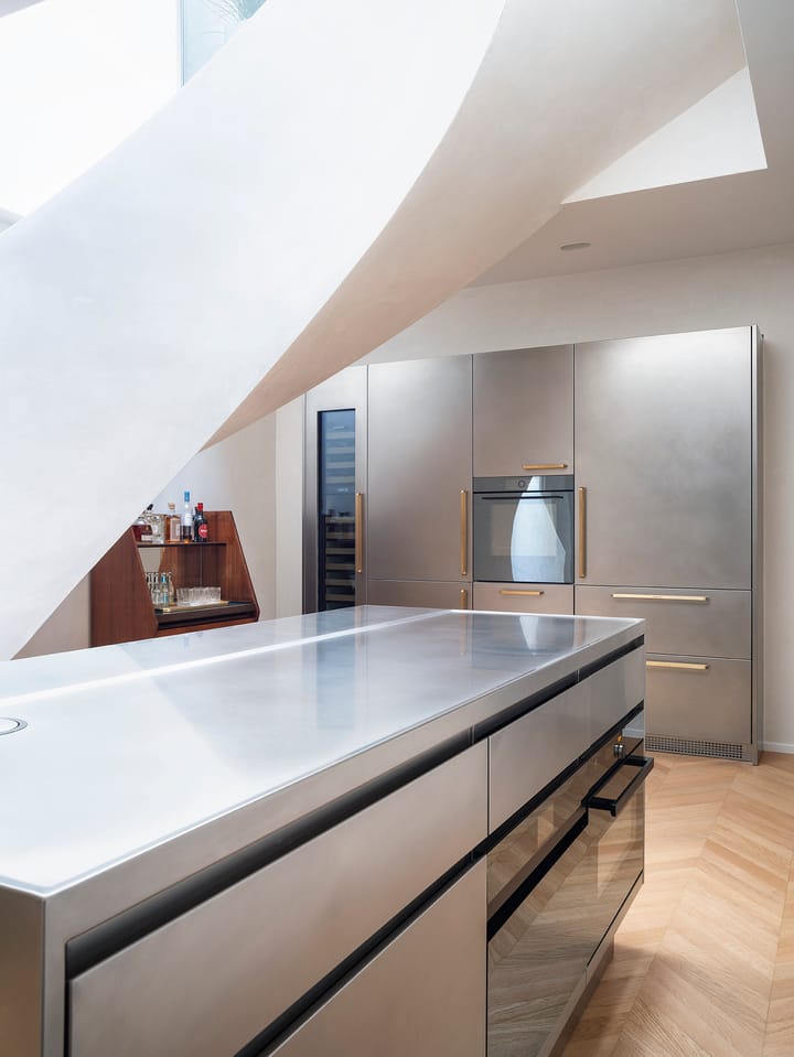 The Kitchen Atelier made of stainless steel by Abimis for a house in Milan