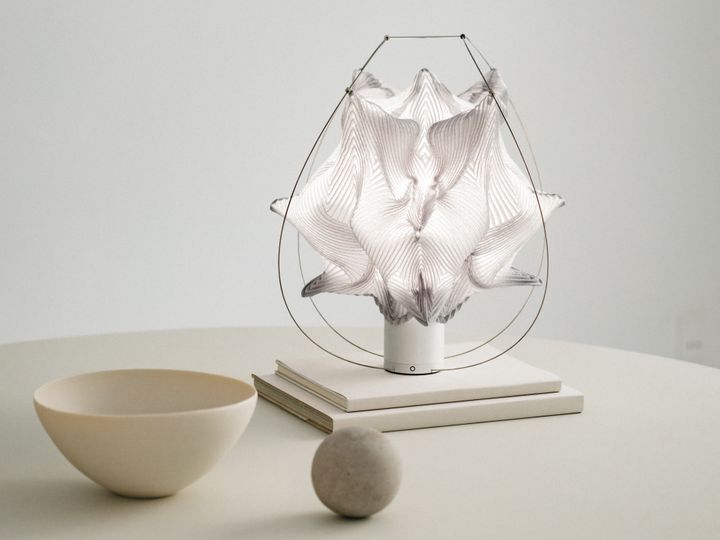 Portable lamps by Ambientec and A-POC ABLE ISSEY MIYAKE at