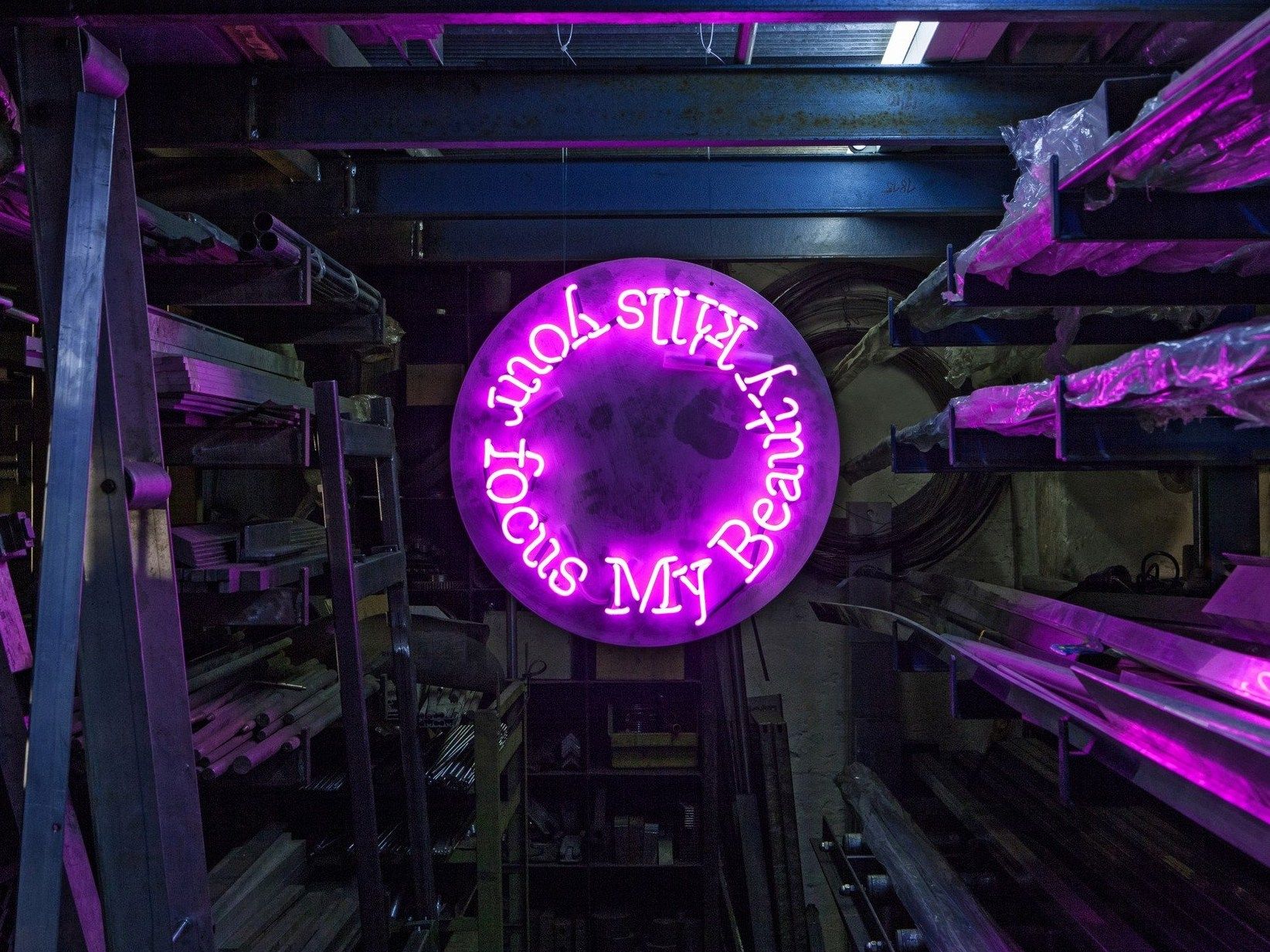 Wallmounted neon light installation BEAUTY By sygns