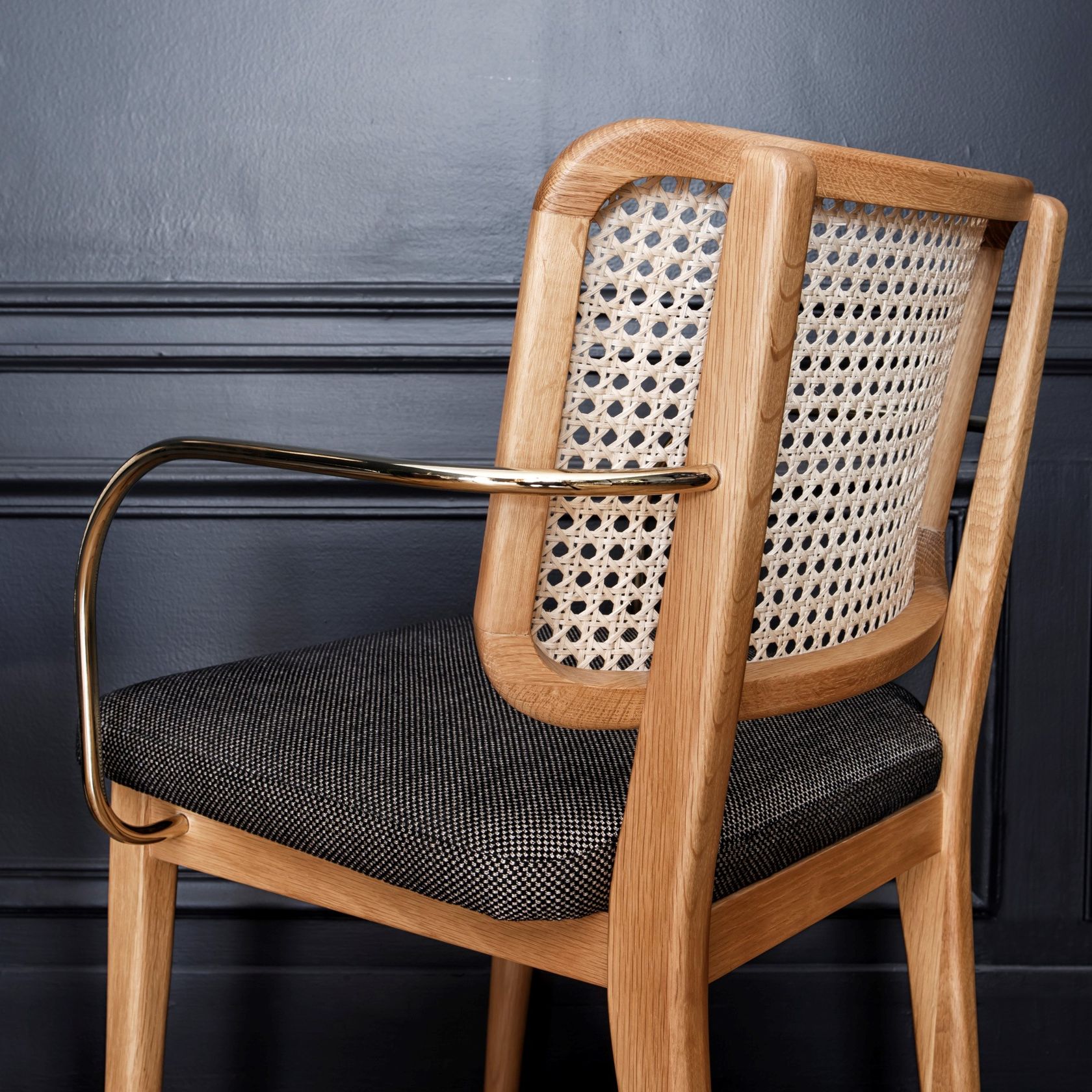 WICKER Vintage style wicker chair with armrests By RED EDITION