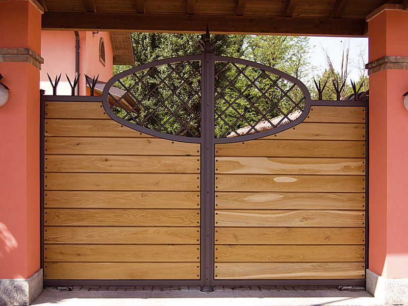 Iron gate covered with wood By QUARTIERI LUIGI