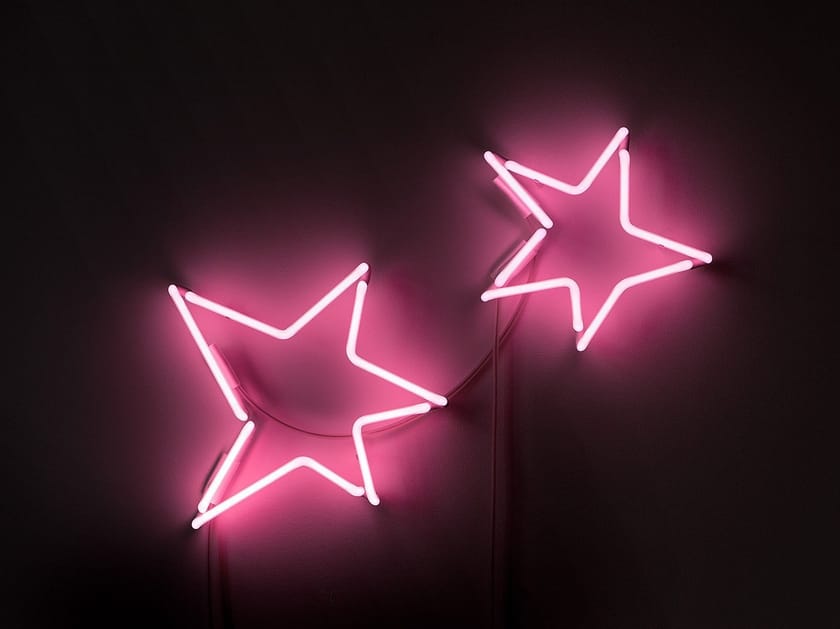 Wallmounted neon light installation COSMIC By sygns design Lilly
