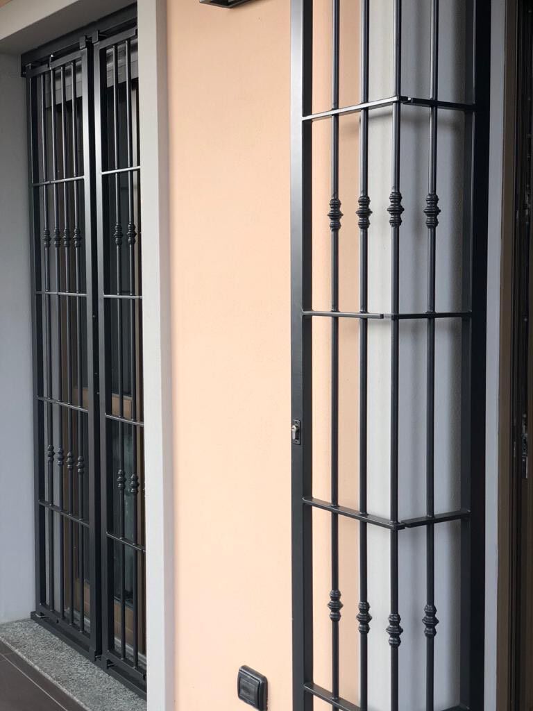 Hinged opening gratings Iron security bar By Centro Inferriate