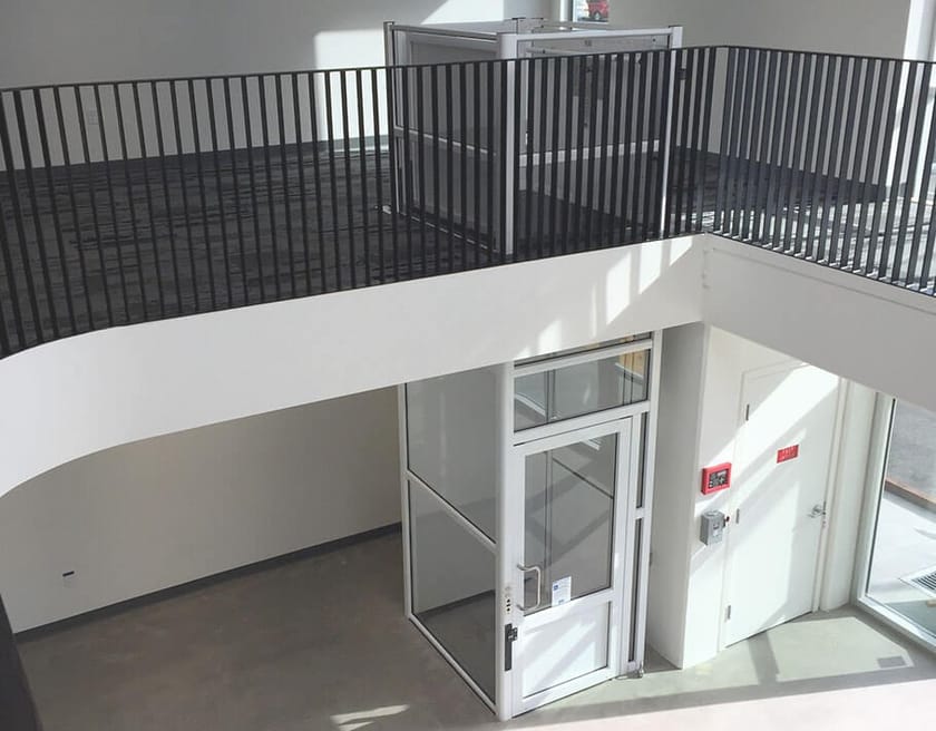 Platform lift GENESIS ENCLOSURE Vertical Platform Wheelchair Lift