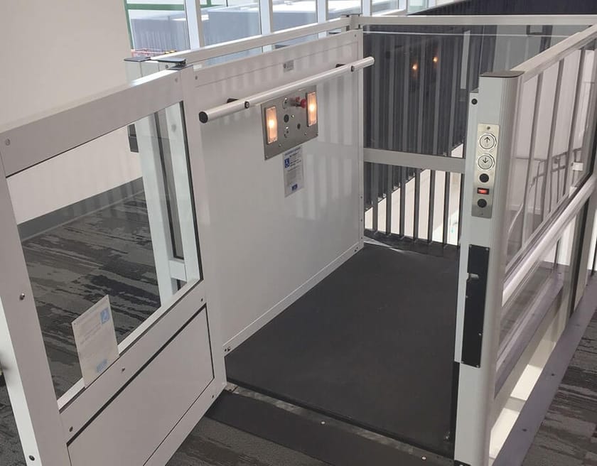 Platform lift GENESIS ENCLOSURE Vertical Platform Wheelchair Lift