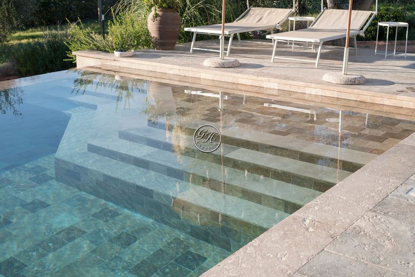 Swimming pool 1 Natural stone swimming pool with waterfall By GH LAZZERINI