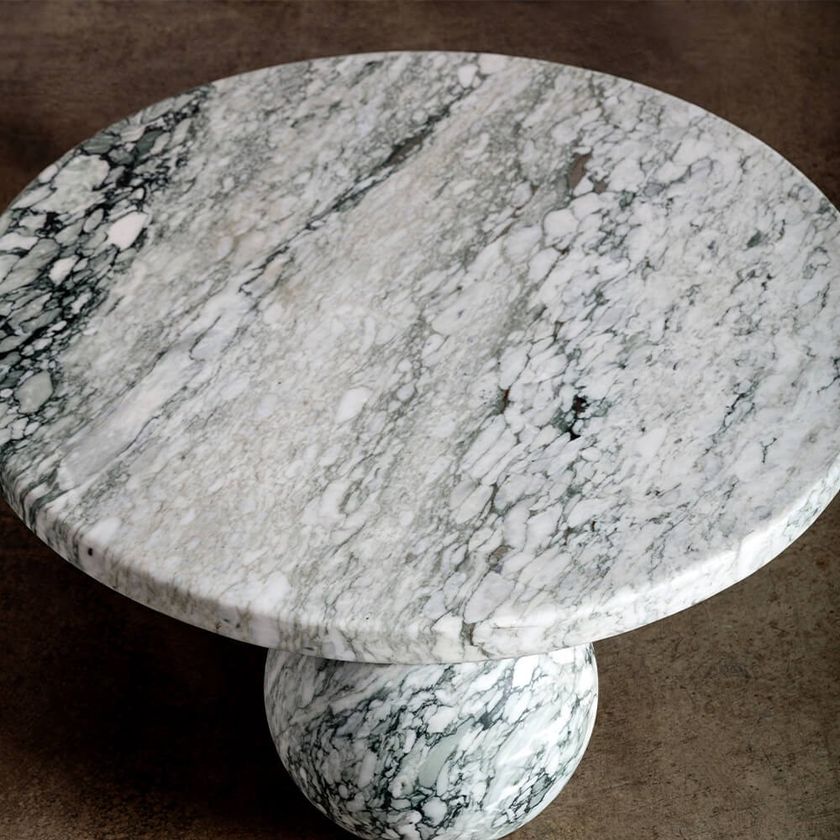 MORRO Round natural stone coffee table By Kelly Wearstler