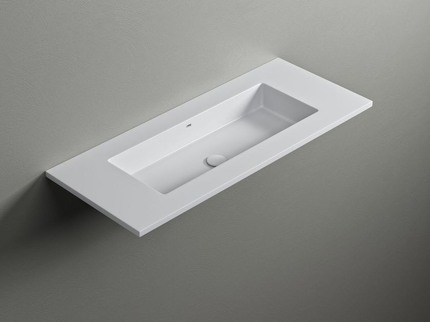 ROUNDED80 Rectangular Corian® washbasin with integrated countertop By ...