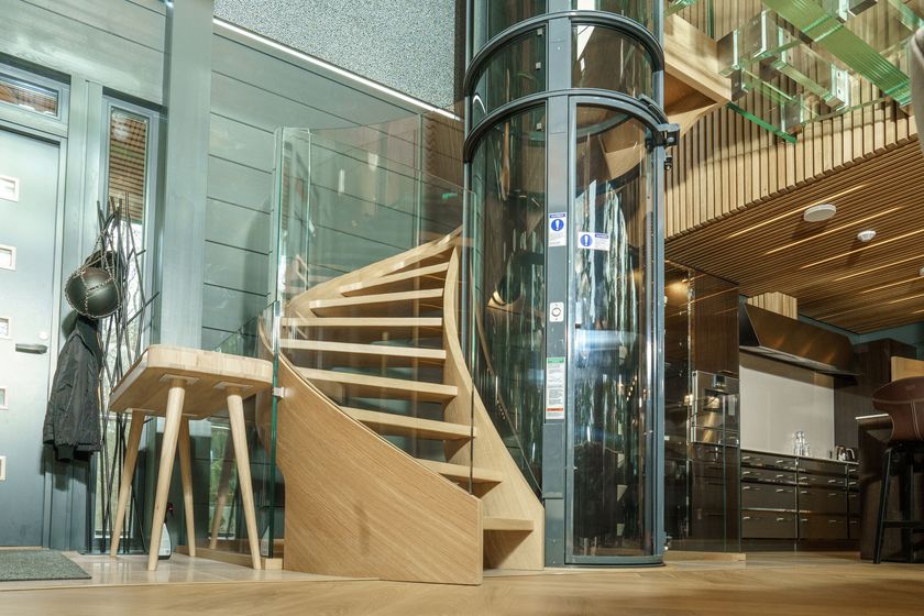 Wood and glass Open staircase with lateral stringers HELICAL STAIRCASE ...