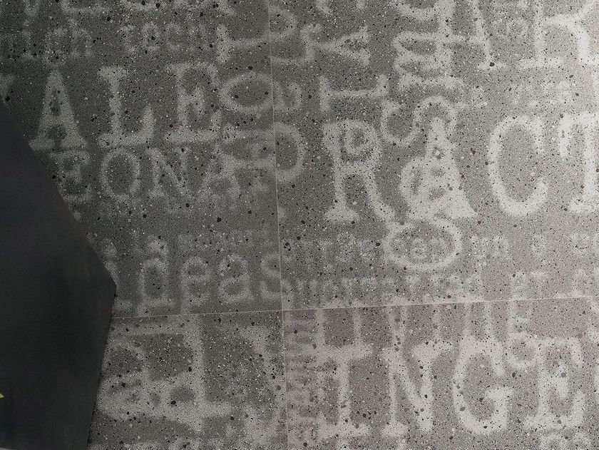 OVERCOME LETTERS Full-body porcelain stoneware wall/floor tiles By Leonardo