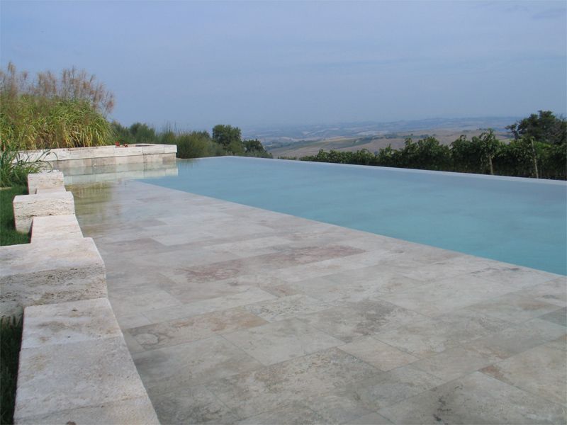 Piscina interrata a sfioro in cemento Piscina interrata - INDALO PISCINE