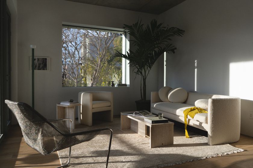 SEGMENT Low handmade rectangular travertine coffee table By TRNK