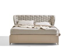 Letto matrimoniale con testiera capitonn�&nbsp;CULTO - NOCTIS