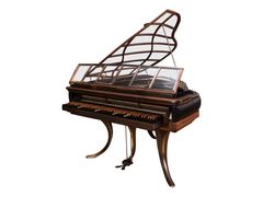 PIANOFORTE A CODA IN PELLE NERA INTRECCIATA E OTTONE OSSIDATO&nbsp;PH GRAND PIANO LEGACY - TONEART INTERIOR