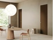 FLUA by Scrigno - Porta a battente a filo muro