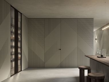 Decorated door integrated into boiserie INTEGRATED DOORS BARAUSSE