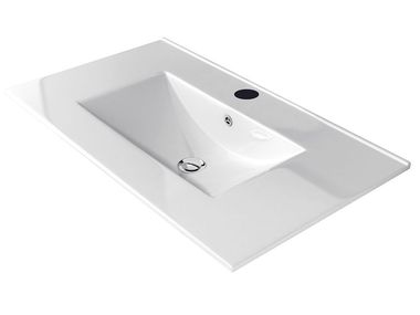 Single porcelain washbasin with integrated countertop MOMA Blubbain