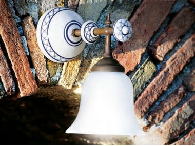 Aldo Bernardi, CARACOI Lampada da parete in vetro con braccio fisso