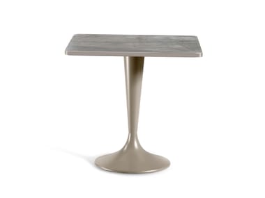 GABER, GLEN ROUND Tavolo in gres porcellanato con base centrale