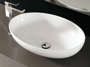 Oval countertop ceramic washbasin NYÙ 17 | Vanity unit Ideagroup