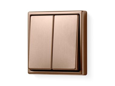 Interruttore in acciaio con finitura bronzo spazzolato LS 990 JUNG