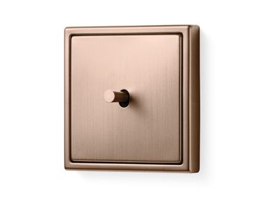 Interruttore in acciaio con finitura bronzo spazzolato LS 1912 JUNG