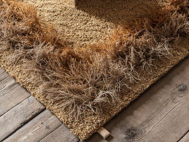 Hand tufted bouclé rug in pure wool and linen  FEATHER Kasthall