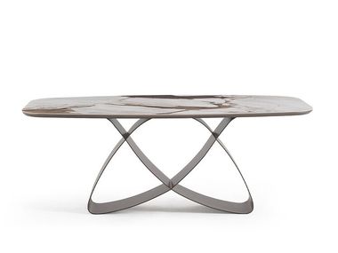 Dining table with sculptural base and Ceramic materials top ALYA NDESIGN