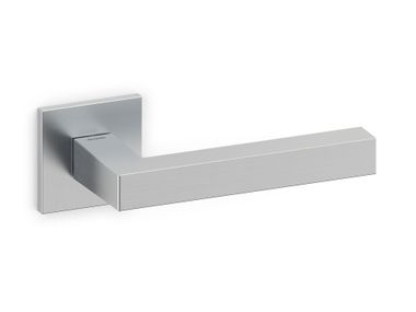 Brass door handle on rose ABC OLIVARI