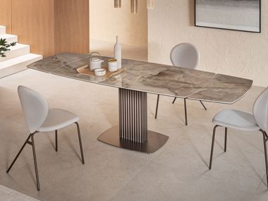 Fixed or extendable table with ceramic top and metal base ONDA RIFLESSI