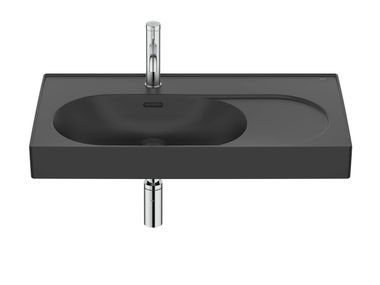 Oval wall-mounted porcelain washbasin with integrated countertop MERIDIAN A32774 Roca