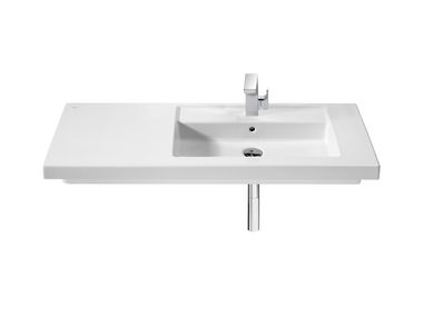 Single porcelain washbasin with integrated countertop PRISMA 32754 Roca
