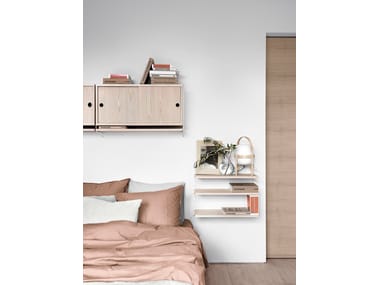 STRING® POCKET Wall-mounted modular MDF shelving unit By String Furniture