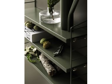 STRING® POCKET Wall-mounted modular MDF shelving unit By String Furniture