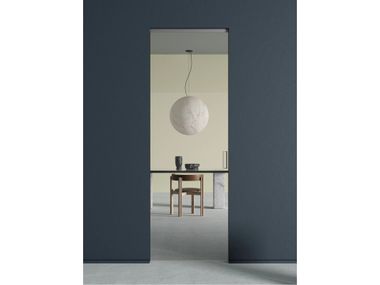Flush-fitting glass internal pocket sliding door ARIA Scrigno