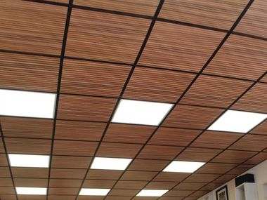 Sound absorbing rock wool ceiling panels with wood effect AMERICAN WALNUT SLATS L Sky-Tile®