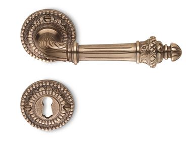 Brass door handle on rose with lock IMPERO | Door handle Colombo Design