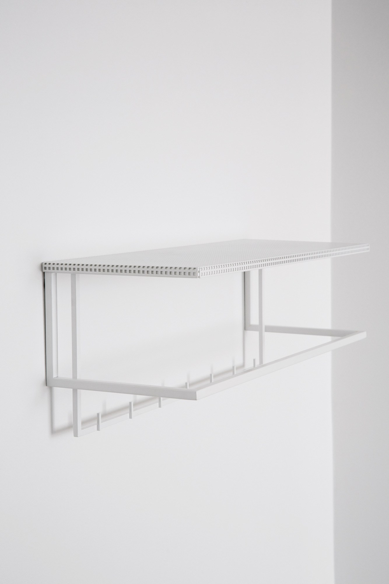 GRID Wall-mounted steel coat rack By Kristina Dam Studio