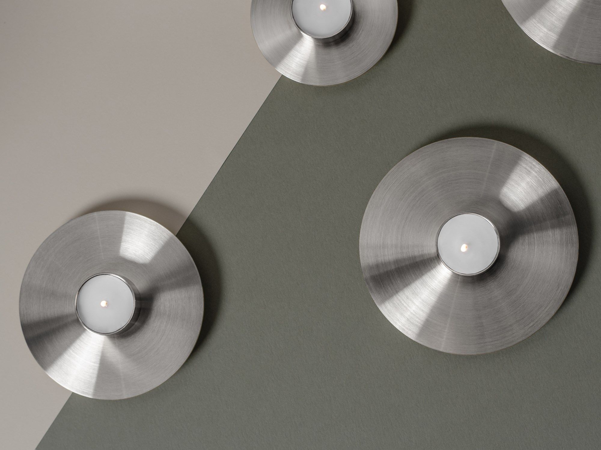 ORB CS2 Stainless steel candle holder By NOOM design Kateryna Sokolova