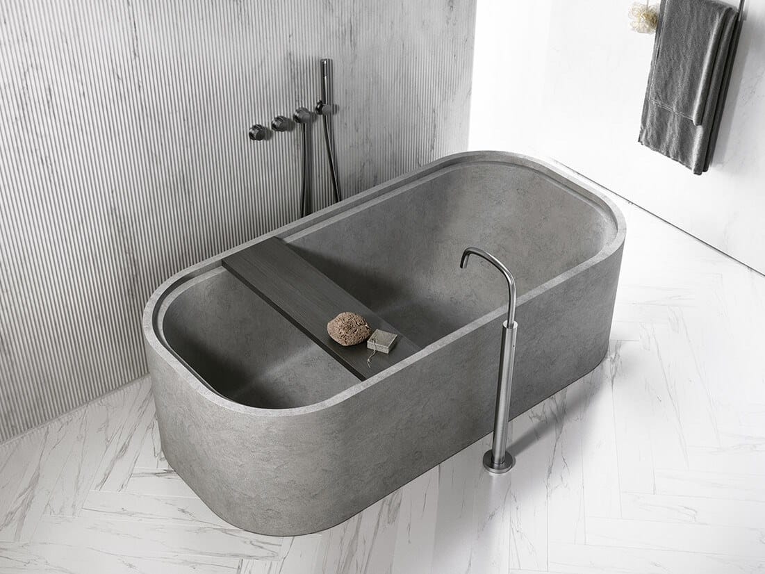 Freestanding oval natural stone bathtub PB BATH By COCOON design Piet Boon