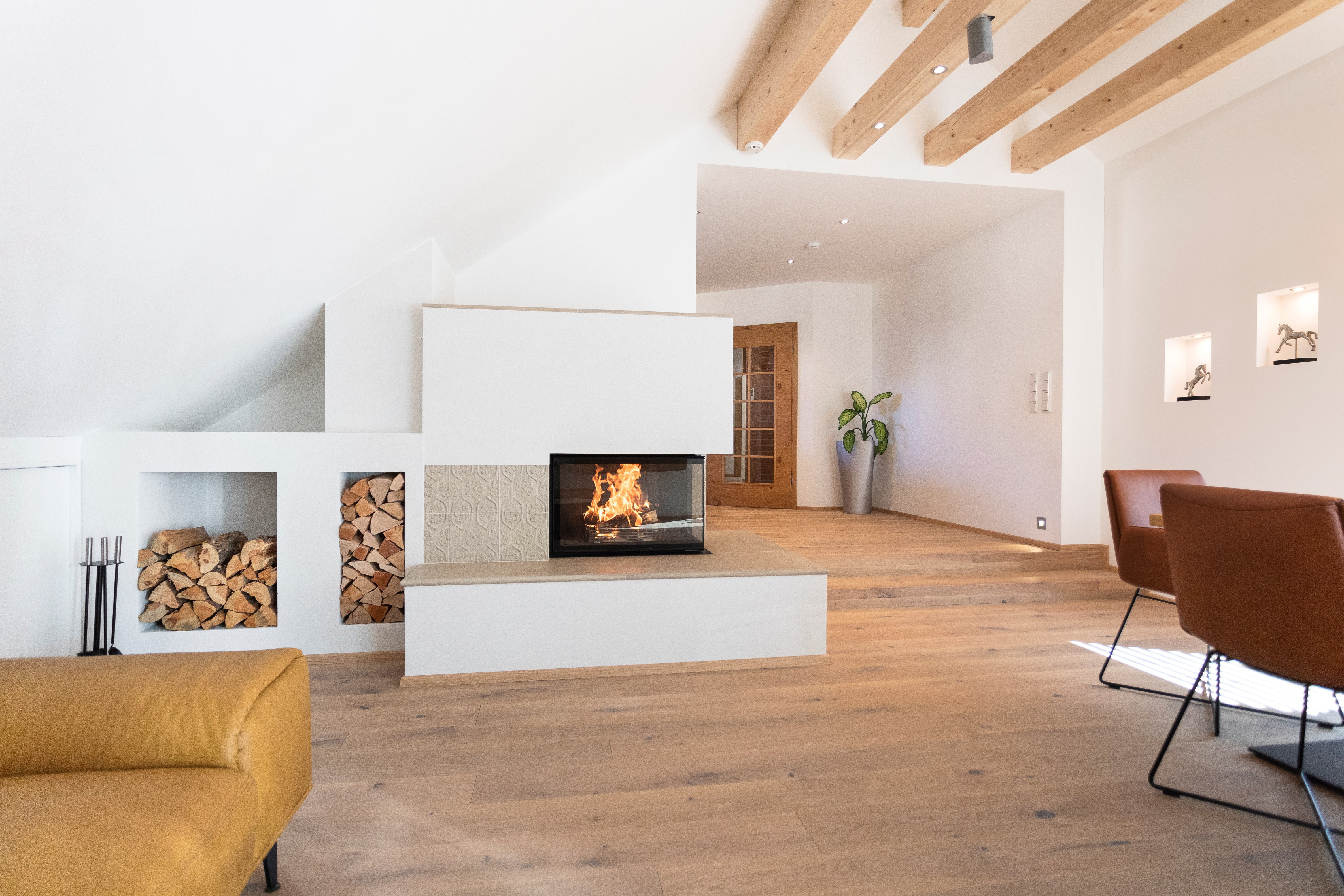 RII Corner wood-burning fireplace By RUEGG
